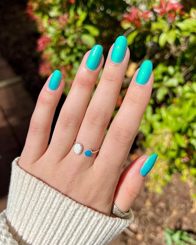 10. Classic Aqua Blue Almond Gel Nails - aqua blue nail ideas