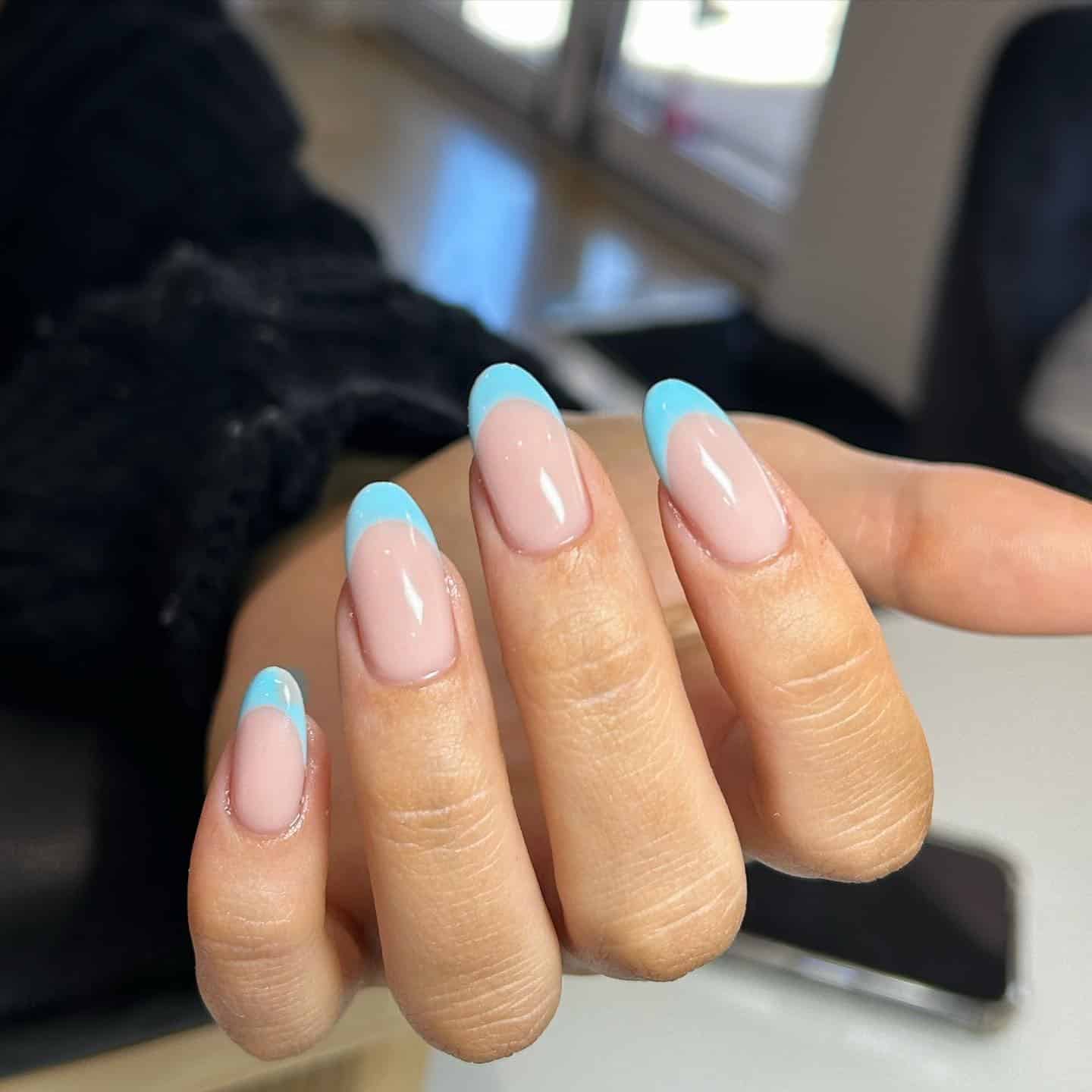 19. Soft Aqua Blue Almond French Tip Nails - aqua blue nail ideas