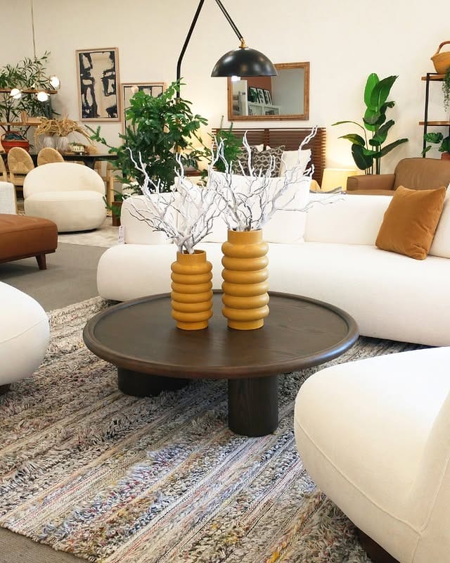 18. Contemporary Living with Cream, Wood, and Soft Accents - warm and cozy living room ideas