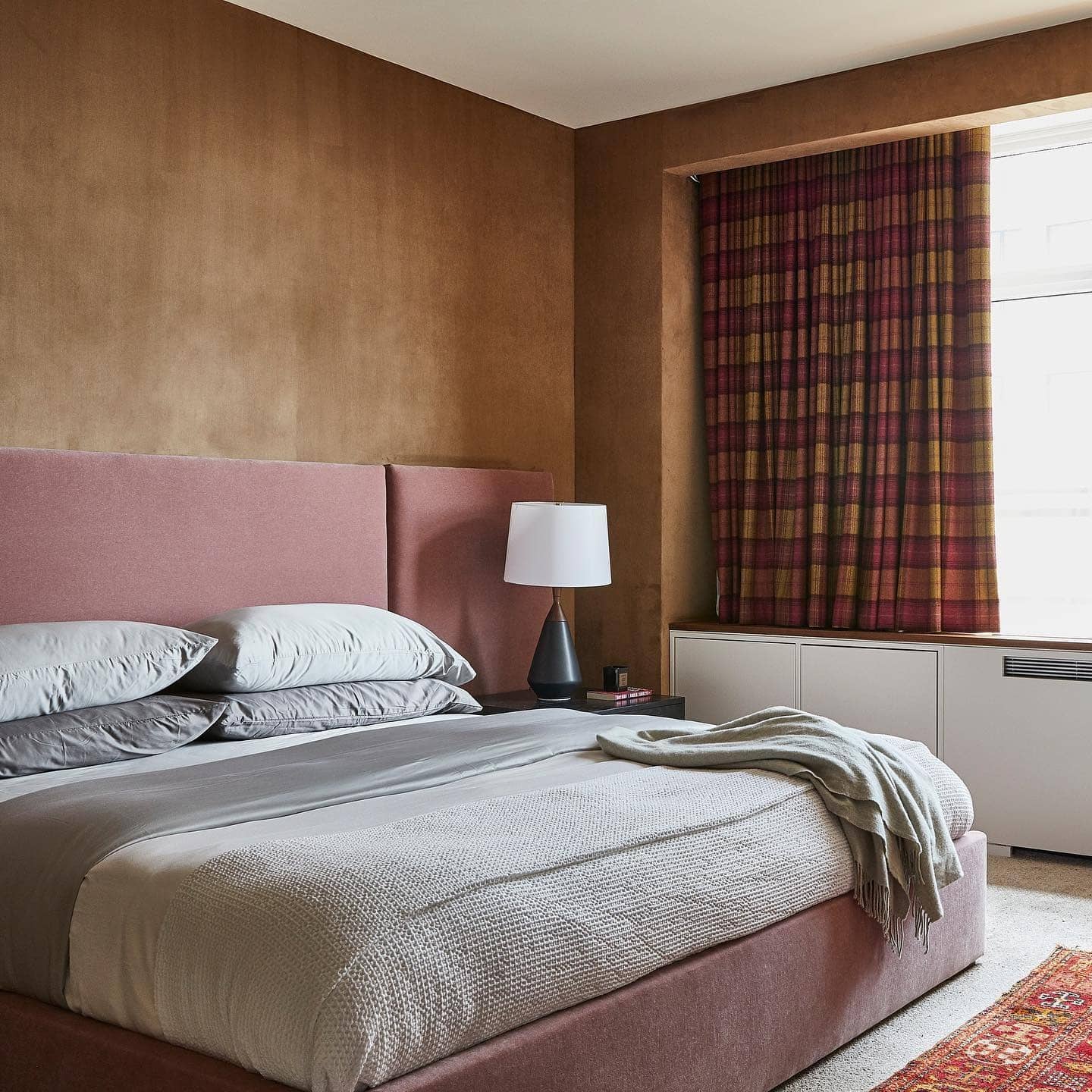 7. Classic Tan Bedroom with Tailored Upholstery - tan bedroom ideas