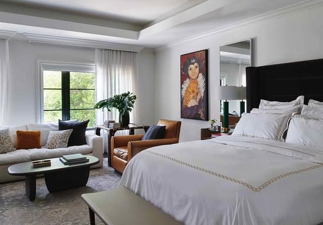 13. Elevated Tan Bedroom with Integrated Seating Area - tan bedroom ideas