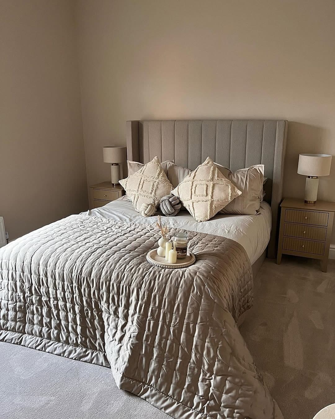 21. Soft Tan Bedroom with Quilted Texture and Neutral Layering - tan bedroom ideas