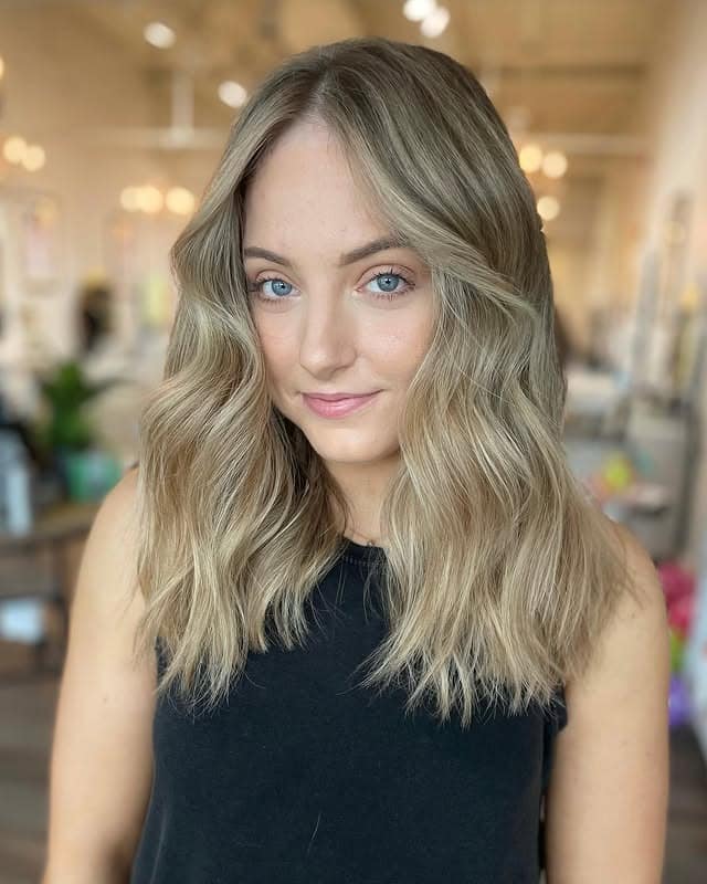 1. Soft Beach Waves with Natural Blonde - Medium-Length Hairstyles