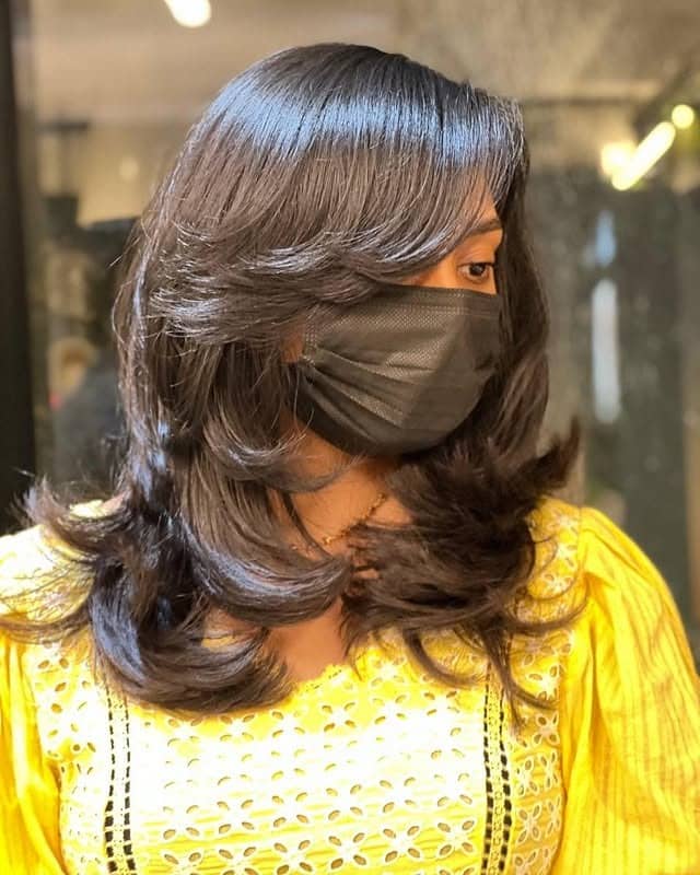 8. Rounded Layers with Rich Chocolate Brown - Medium-Length Hairstyles