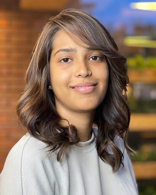 13. Side-Parted Waves with Warm Mocha Brown - Medium-Length Hairstyles