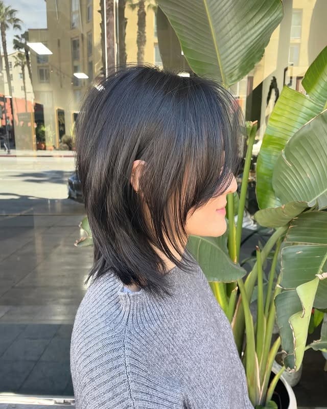 15. Modern Shag Layers with Charcoal Black - Medium-Length Hairstyles
