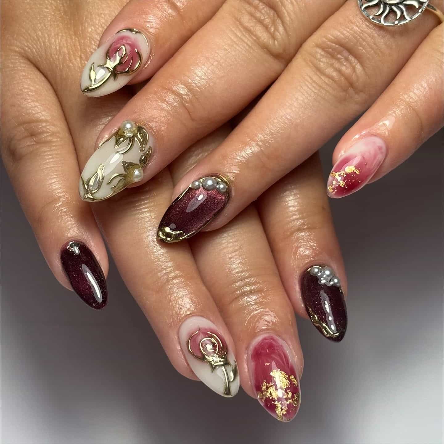 8. Baroque Accent Nails in Burgundy, Cream, and Gold - asian nail ideas