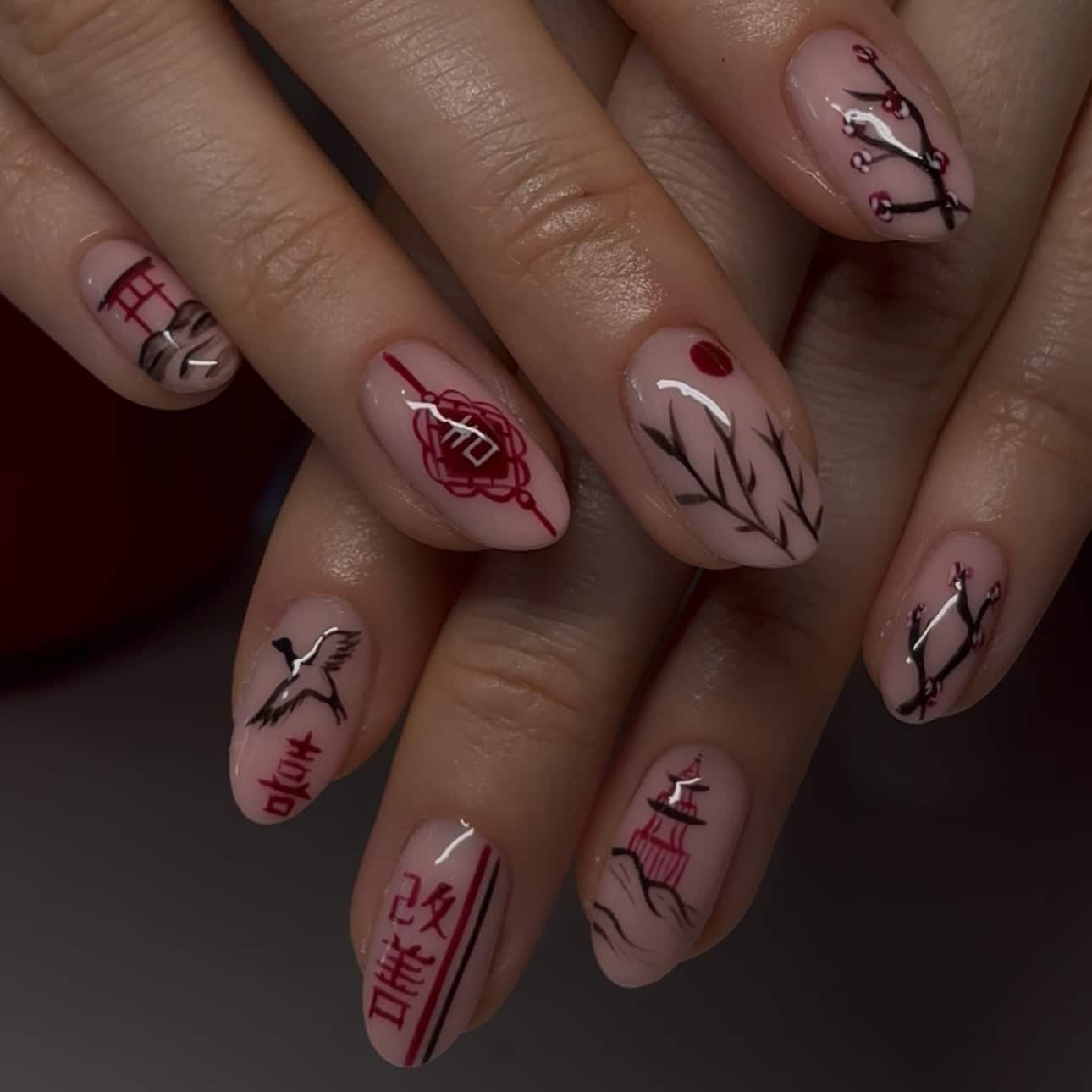 11. East Asian Ink Art Nails in Blush and Crimson - asian nail ideas