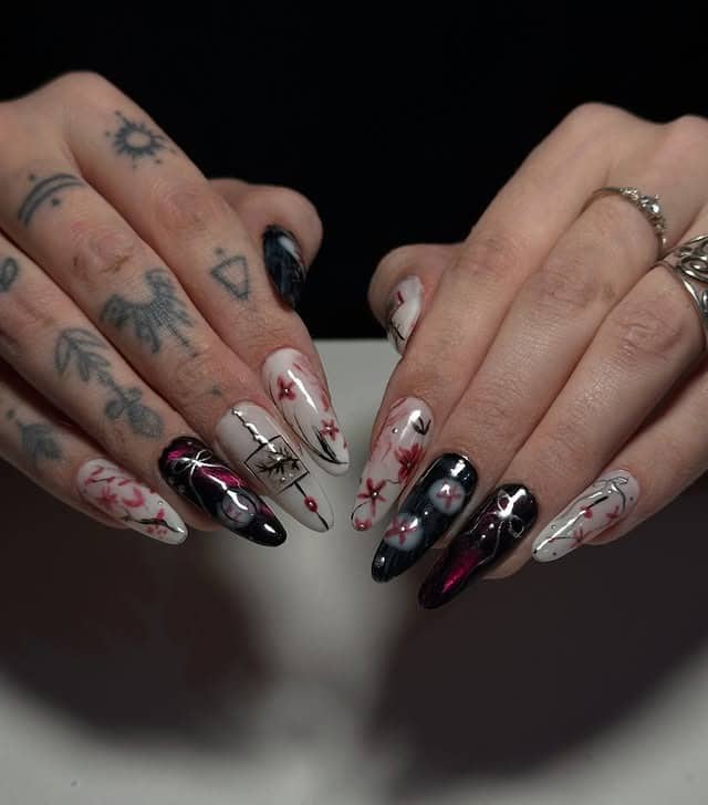 13. Dark Botanical Almond Nails in Black, Ivory, and Wine - asian nail ideas