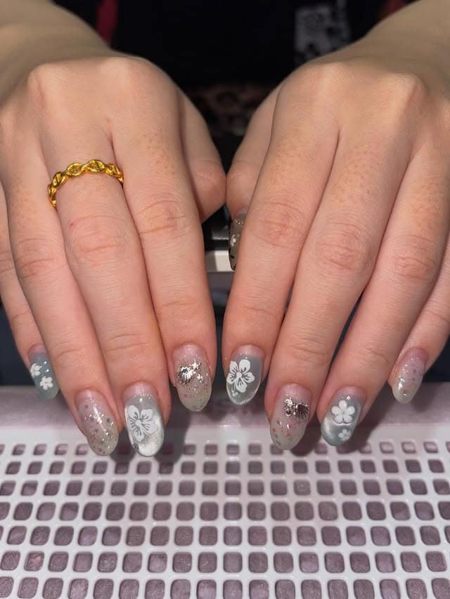 18. Floral Glitter Nails in Sage Green and Clear - asian nail ideas