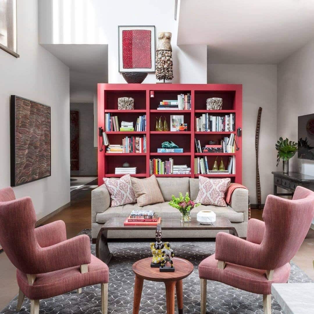6. Contemporary Contrast with Pink and Crimson - pink living room ideas