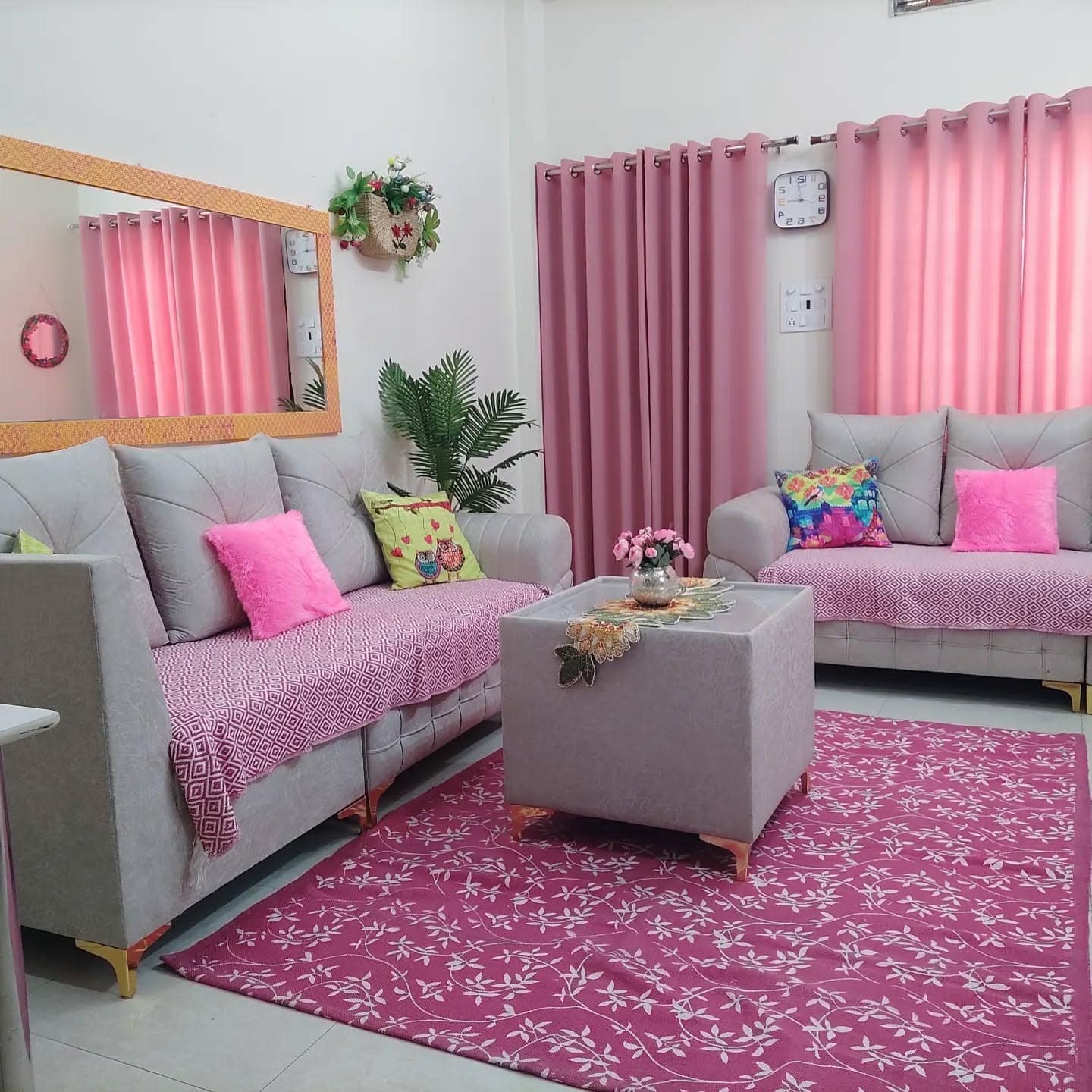 9. Soft Pink Family Room with Practical Comfort - pink living room ideas