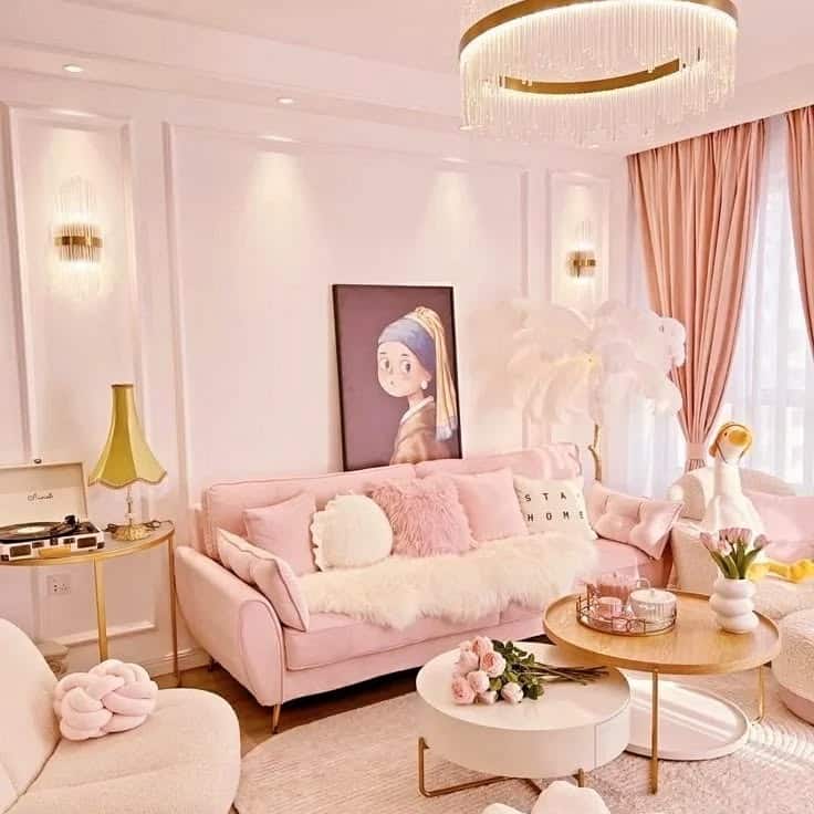 19. Glam Pink Living Room with Sculptural Lighting - pink living room ideas