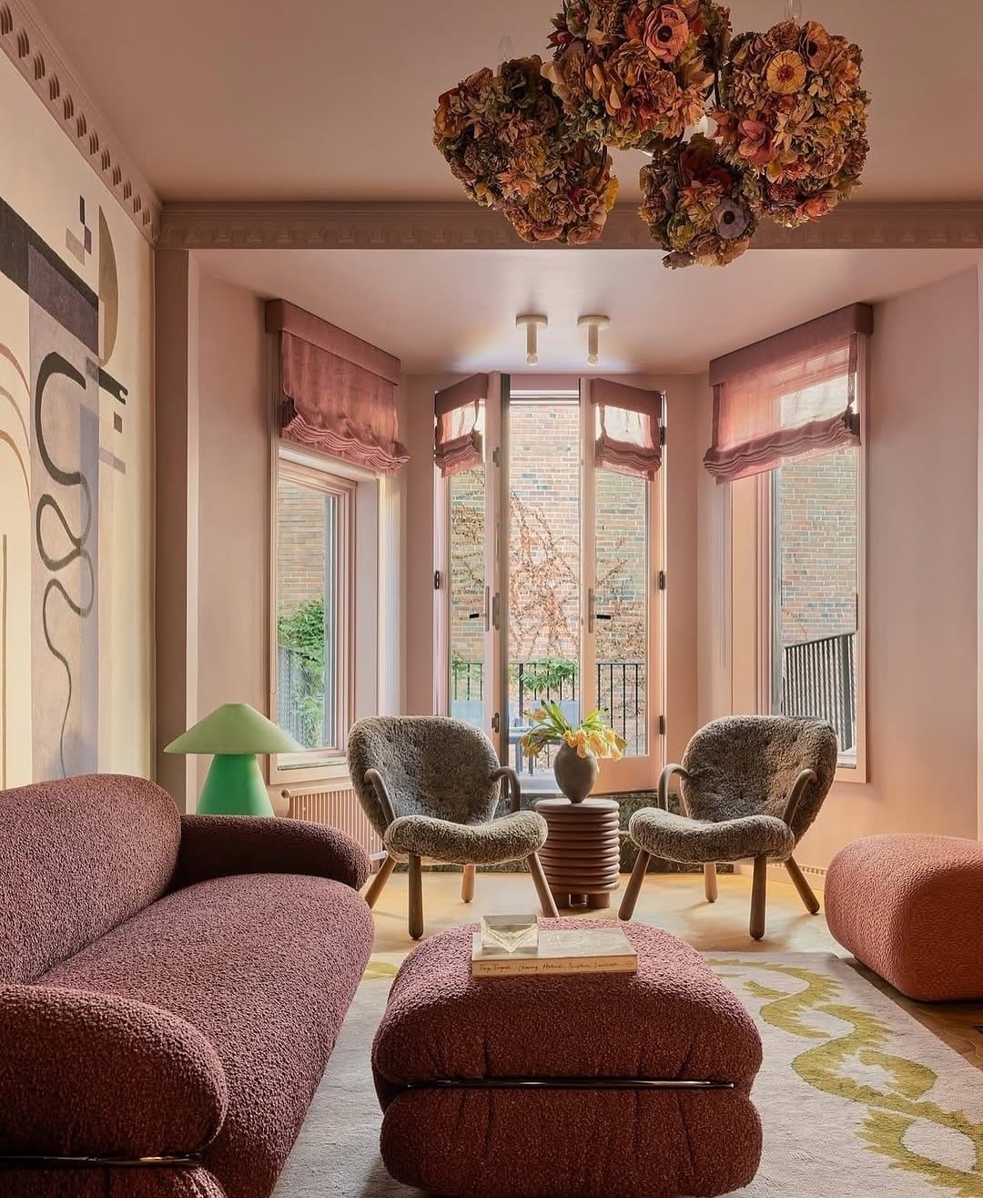 20. Warm Pink Living Room with Textured Upholstery - pink living room ideas