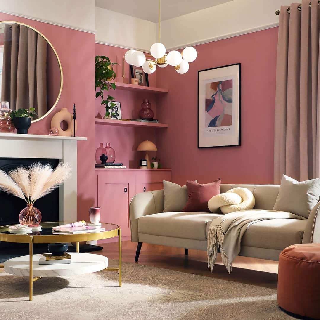 22. Modern Pink Living Room with Cream and Brass Accents - pink living room ideas