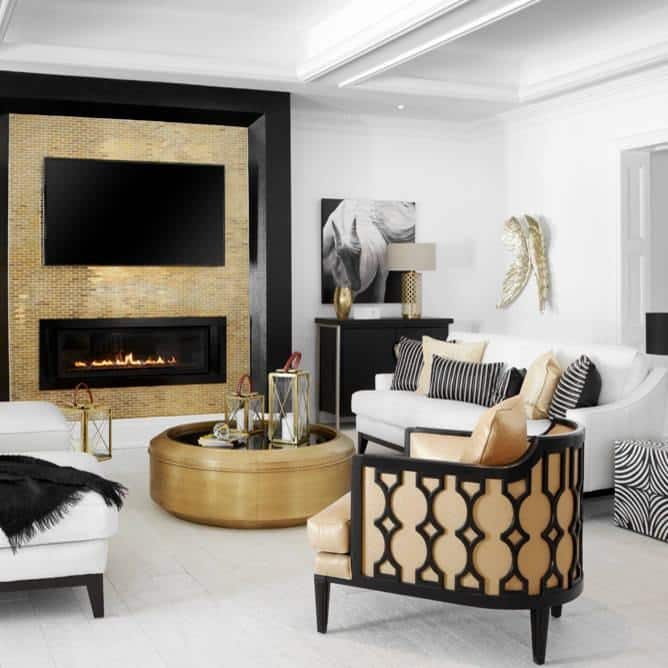 8. Glam Living Room with Black, Gold, and Warm Brown - black and brown living room ideas