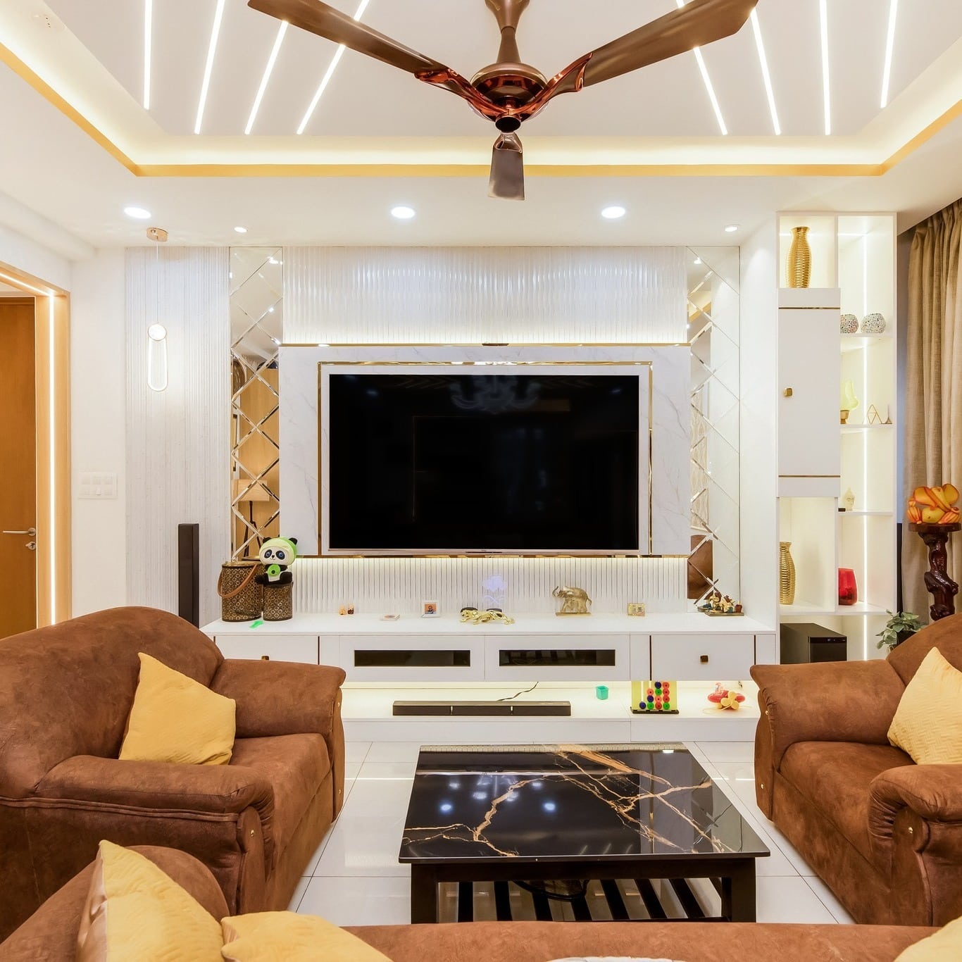 21. Modern Living Room with White, Black, and Warm Brown Accents - black and brown living room ideas