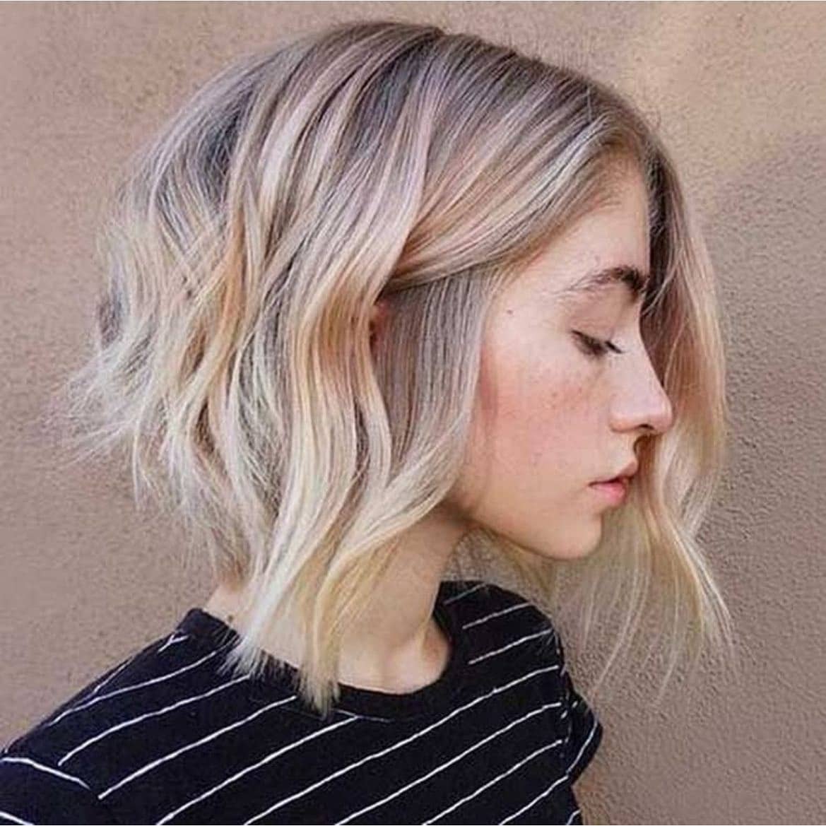 16. Softly Layered Asymmetrical Bob in Ash Blonde - Asymmetrical Bob Hairstyles