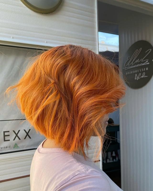 22. Textured Asymmetrical Bob in Vibrant Copper Orange - Asymmetrical Bob Hairstyles