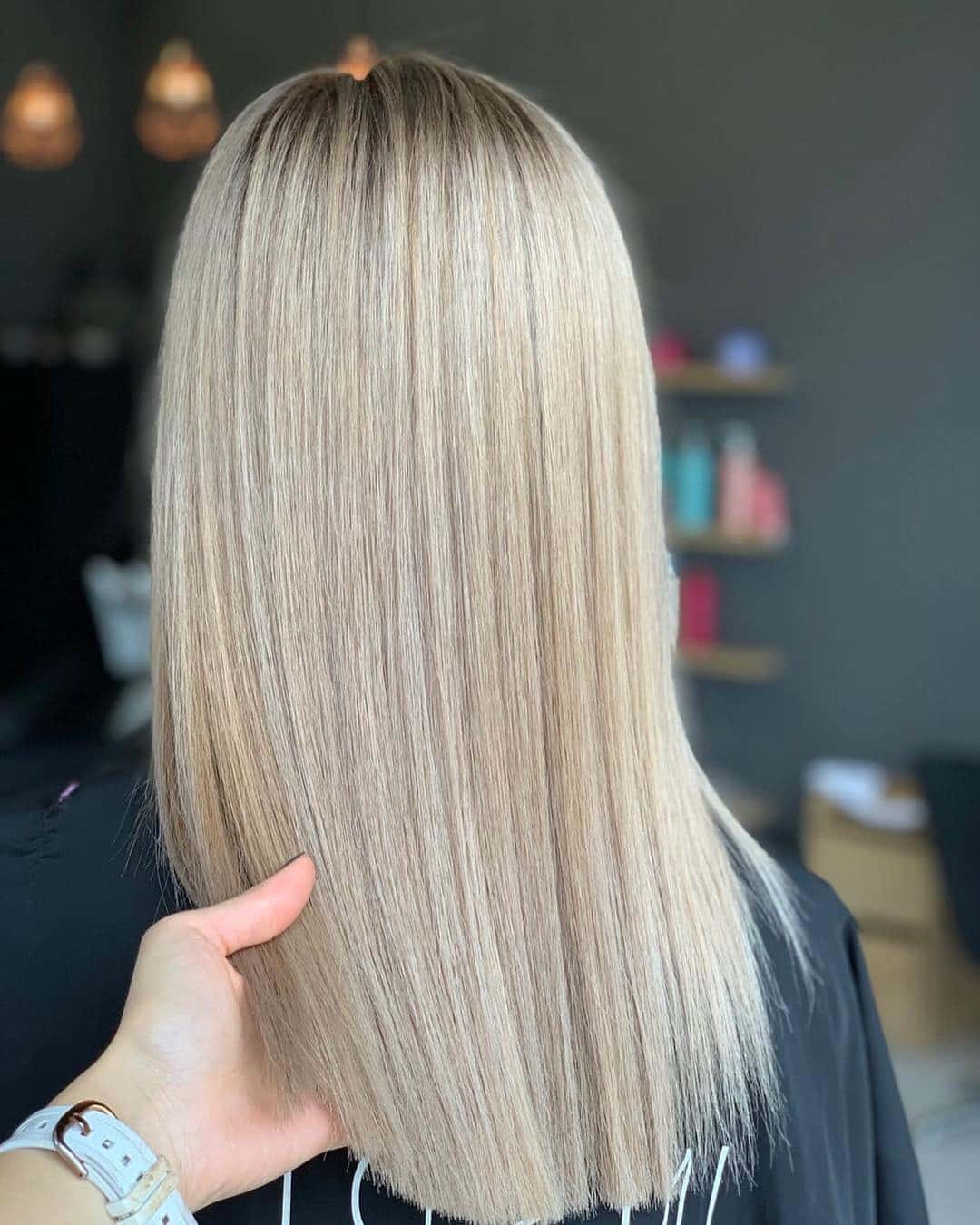 4. Icy Blonde Precision Cut with Root Depth - Blonde Hair with Dark Roots