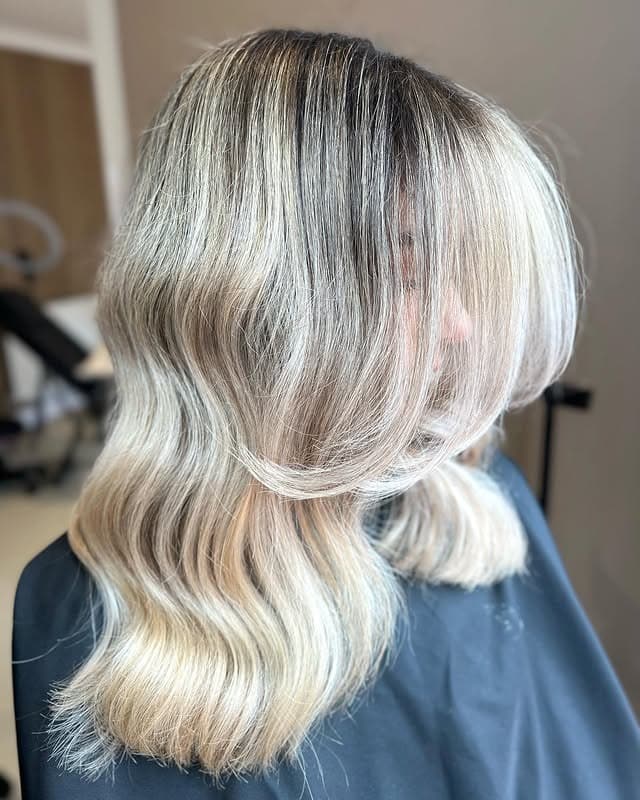 7. Dimensional Blonde with Face-Framing Highlights - Blonde Hair with Dark Roots