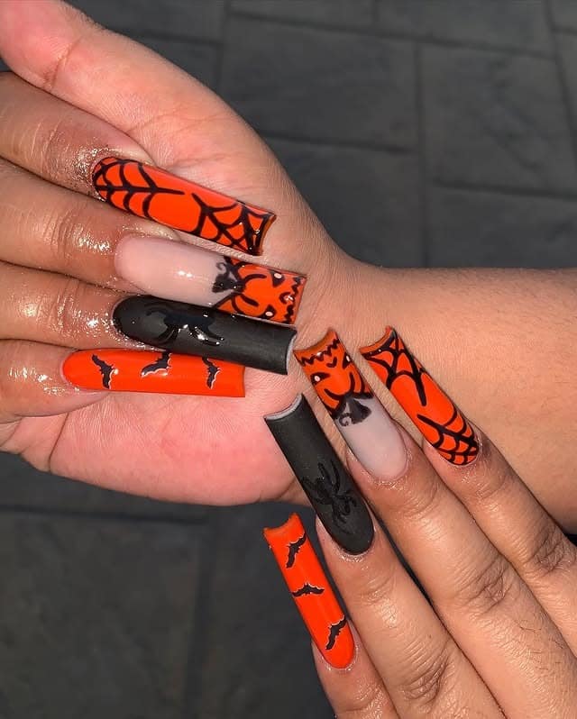 1. Spiderweb Halloween Coffin Nails in Black and Orange - black and orange nail ideas