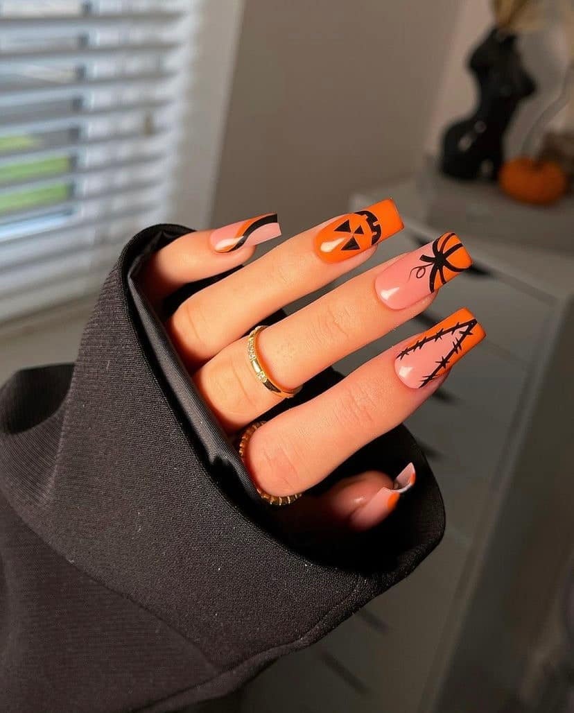 5. Halloween Icon Coffin Nails in Black and Orange - black and orange nail ideas