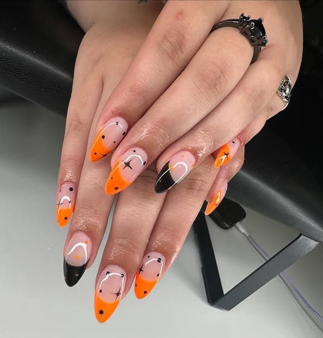 16. Abstract French Almond Nails in Black and Orange - black and orange nail ideas