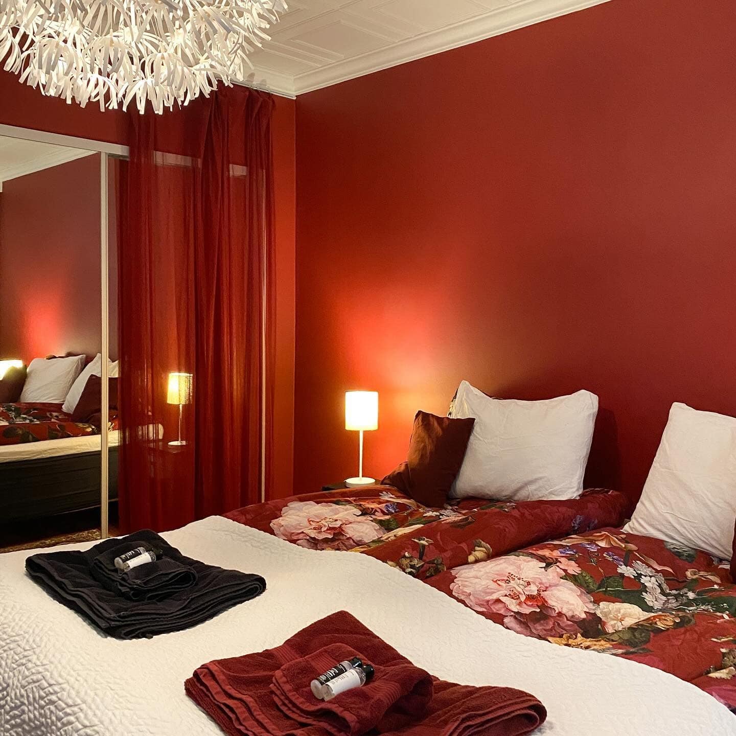 2. Romantic Ruby with Soft Layers - red bedroom ideas
