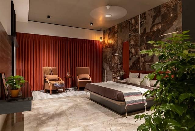 3. Modern Red Luxe Suite - red bedroom ideas