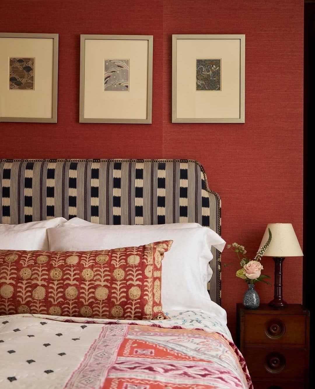 21. Patterned Red Bedroom with Tailored Textiles - red bedroom ideas