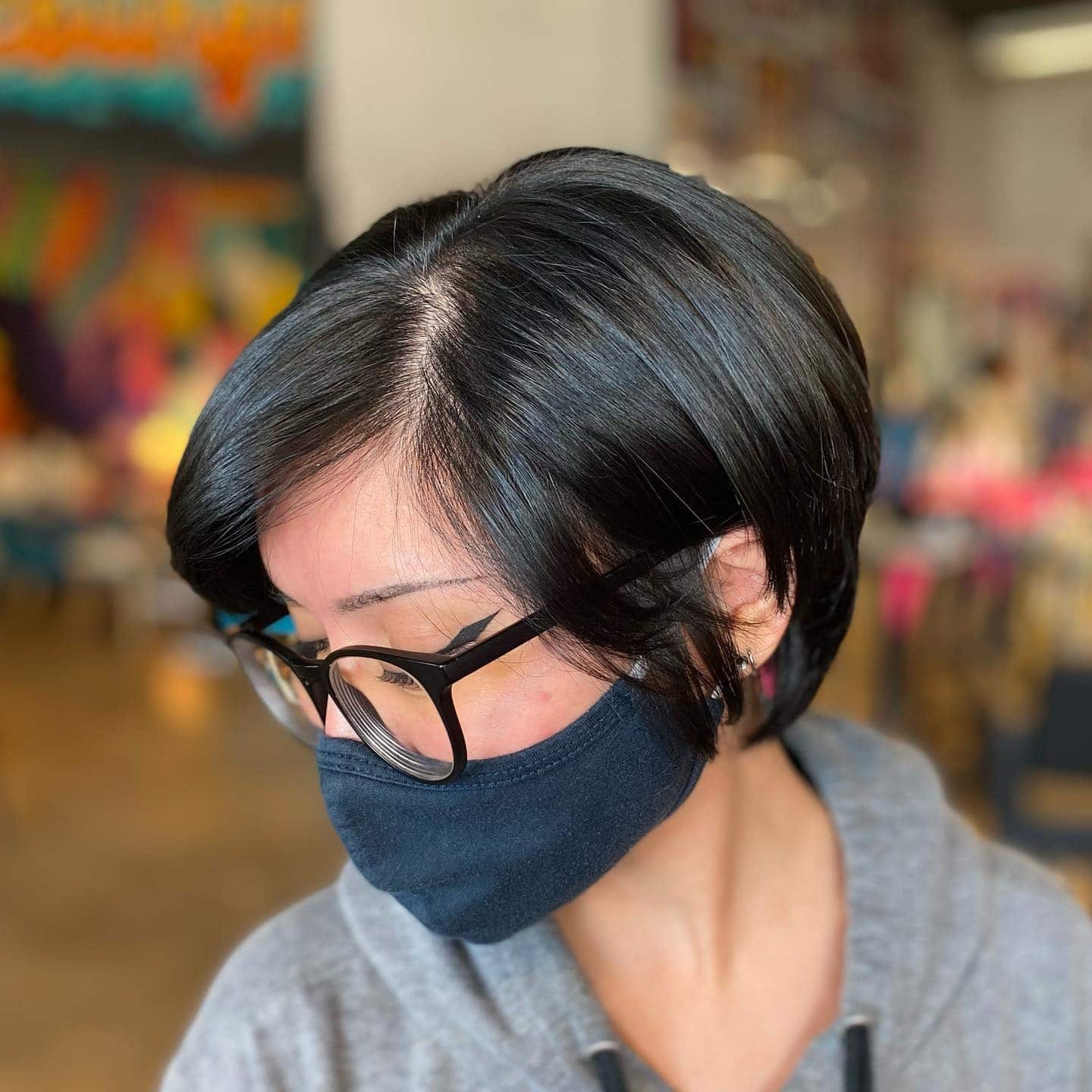 2. Sleek Jet Black Side-Parted Pixie Bob - Pixie Bob Haircuts