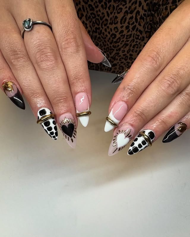 6. Sculpted Almond Nails with Black, White, and Gold Art - black, white and gold nail ideas