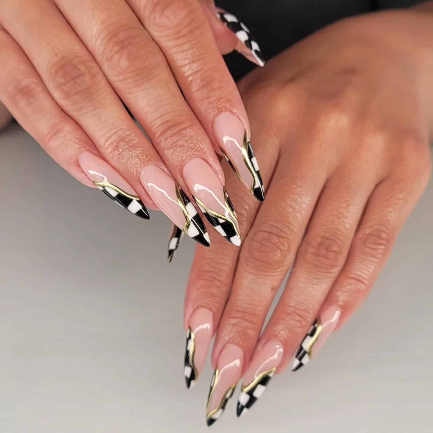 20. Almond Nails with Black and White Patterned Tips - black, white and gold nail ideas