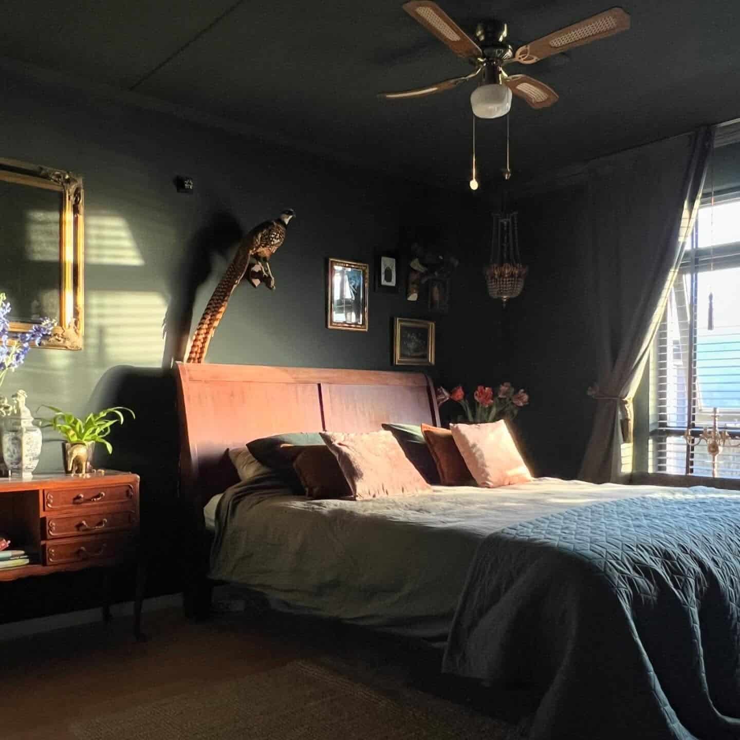 22. Moody Dark Green Bedroom with Vintage Character - dark green bedroom ideas