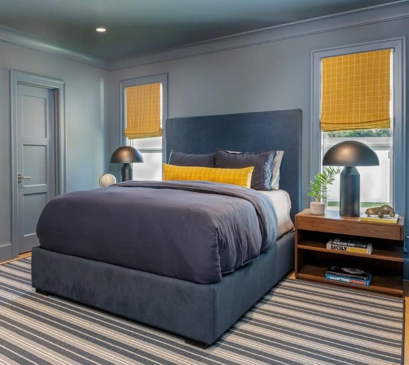 10. Tailored Blue Upholstered Bed with Yellow Roman Shades - yellow and blue bedroom ideas