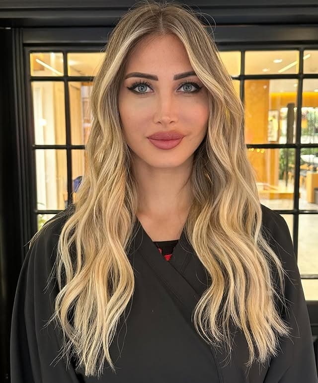 8. Polished Golden Blonde Lengths - Golden Blonde Hair Color