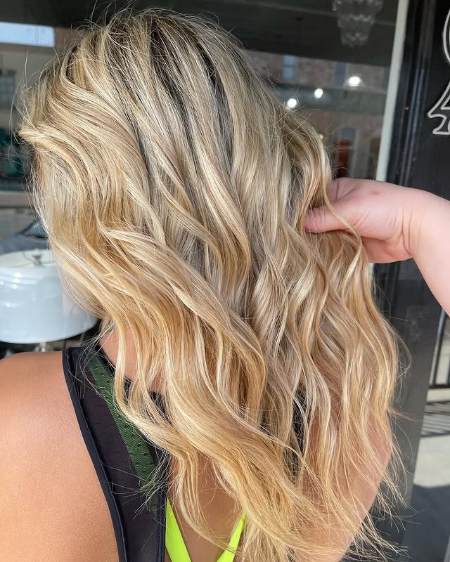 13. Textured Golden Blonde Beach Waves - Golden Blonde Hair Color