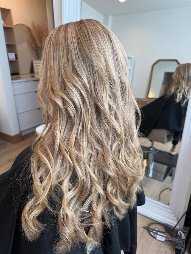 19. Dimensional Golden Blonde Waves - Golden Blonde Hair Color