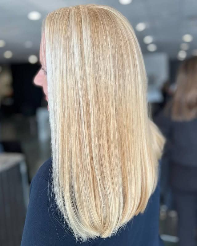 21. Sleek Golden Blonde Precision Cut - Golden Blonde Hair Color