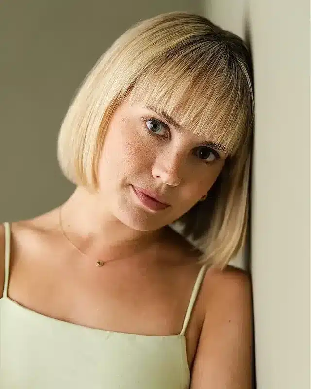4. Blunt Chin-Length Bob with Full Bangs in Light Blonde - Bob Hairstyles with Bangs
