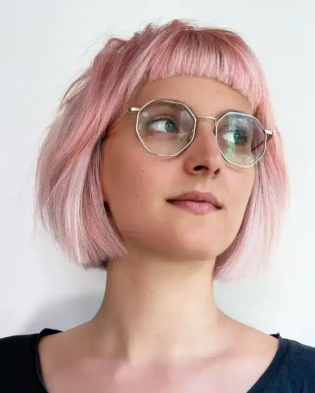 6. Modern Shaggy Bob with Short Bangs in Rose Pink - Bob Hairstyles with Bangs
