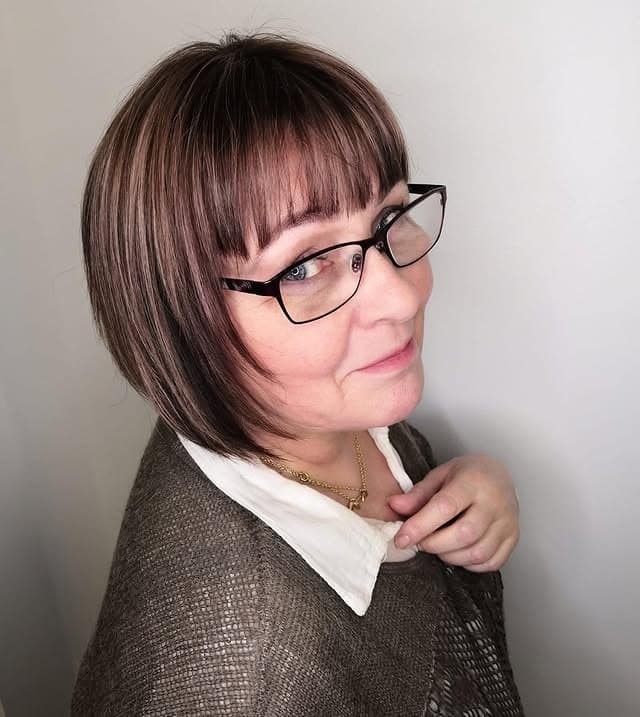 15. Tapered Bob with Feathered Bangs in Chestnut Brown - Bob Hairstyles with Bangs