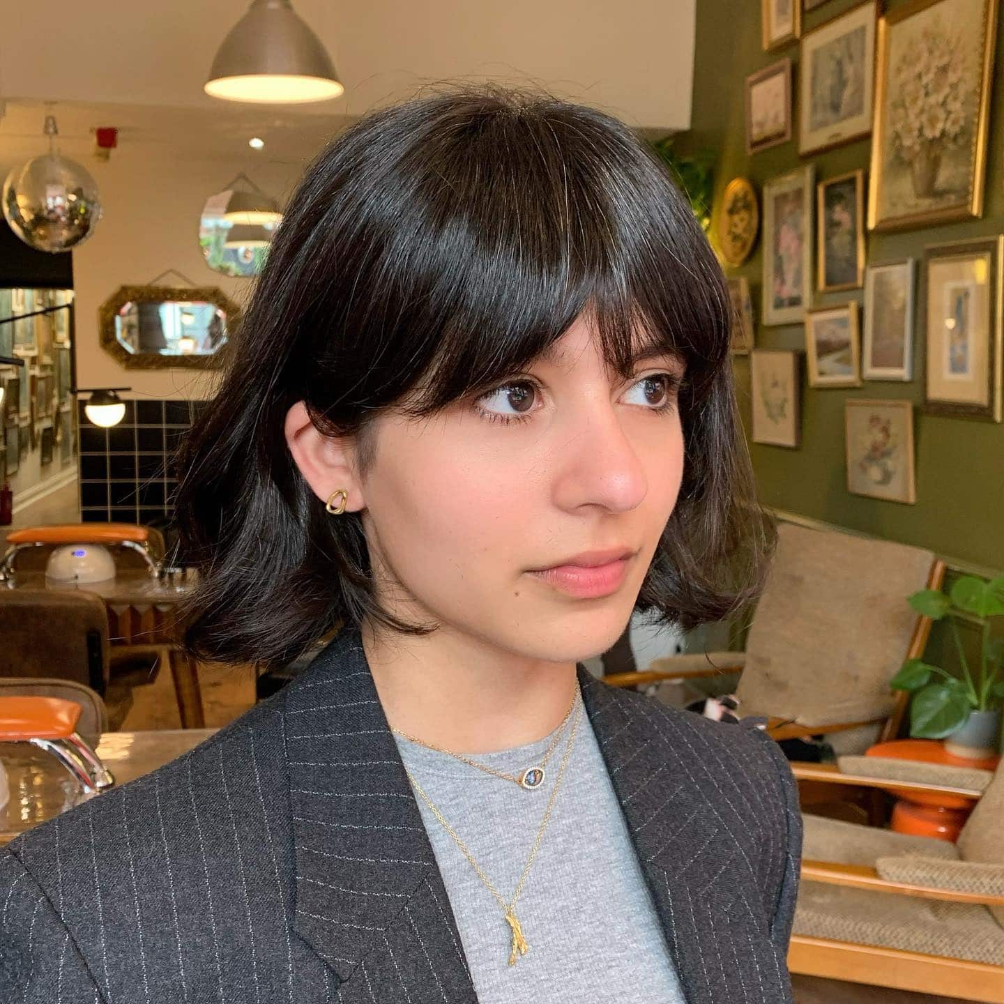 18. Wavy Bob with Light Bangs in Smoky Ash Blonde - Bob Hairstyles with Bangs