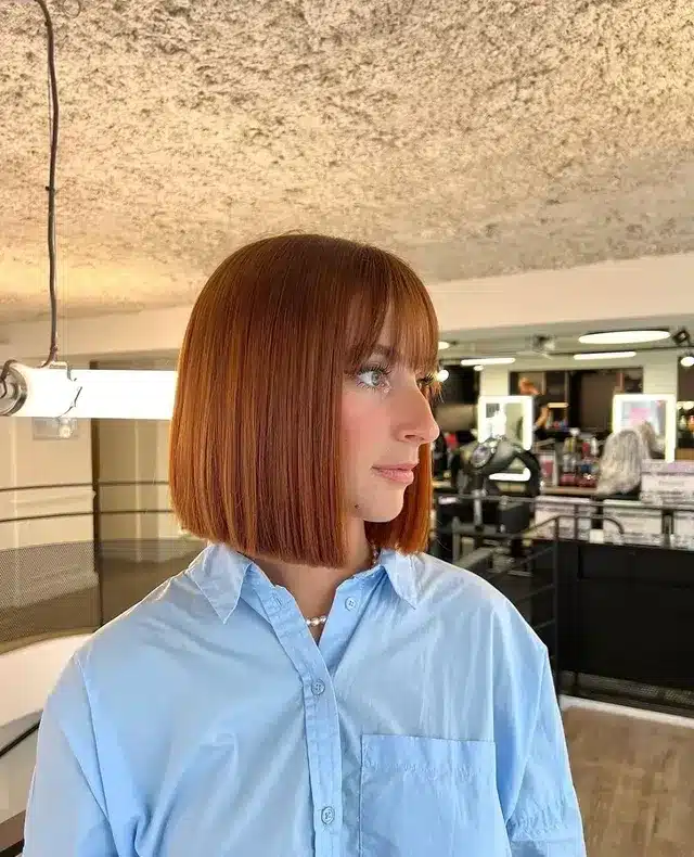 20. Blunt Straight Bob with Bangs in Copper Red - Bob Hairstyles with Bangs