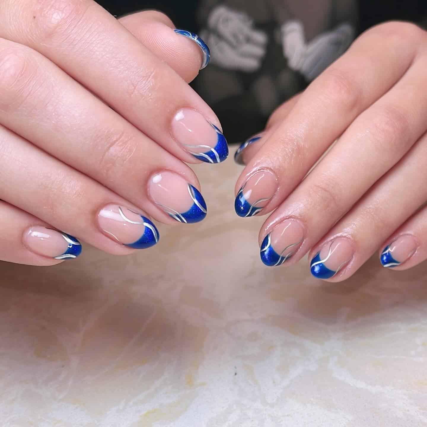 4. Royal Blue Micro Swirl Almond French - blue tip nail ideas