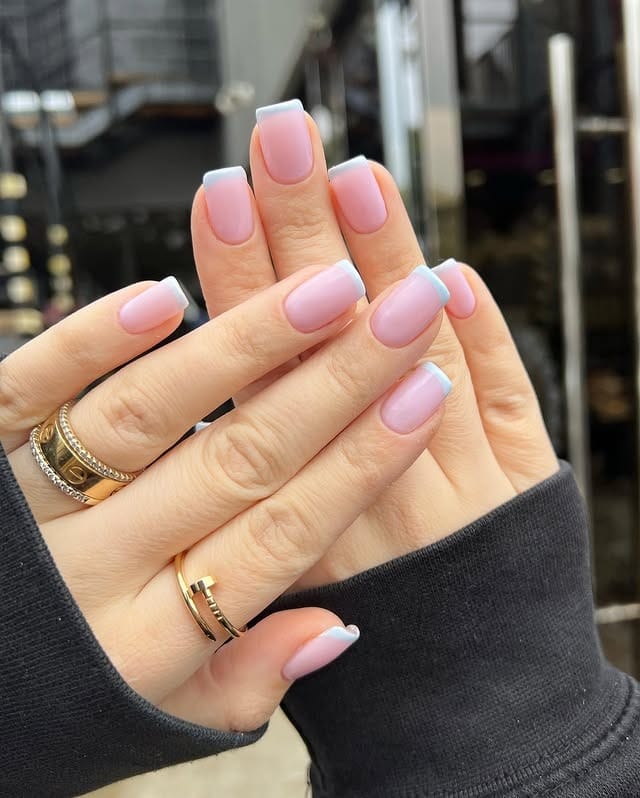8. Soft Lilac Base with Icy Blue French Tips - blue tip nail ideas