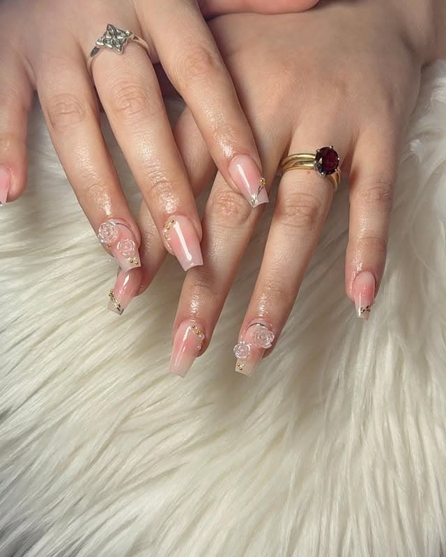 7. Blush Pink Coffin Nails with 3D Floral Embellishments - blush nail ideas