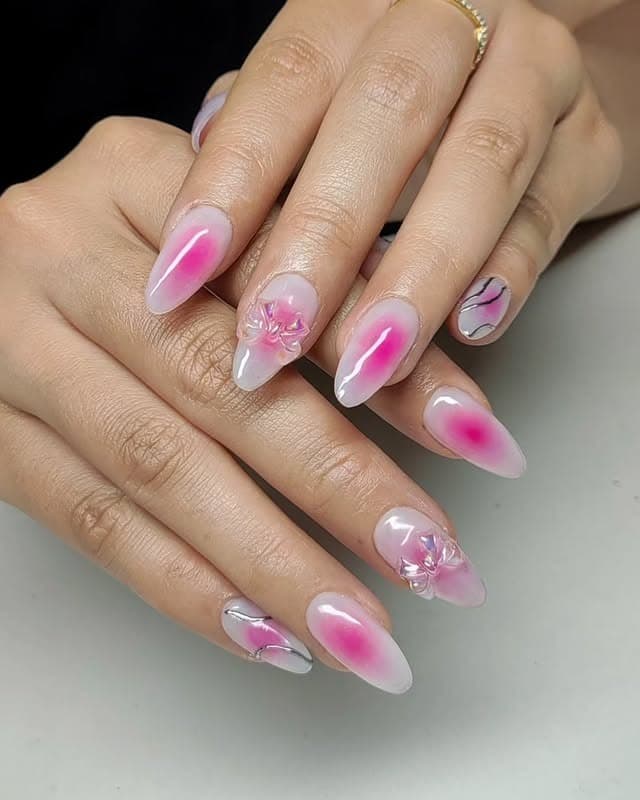 8. Airbrushed Pink Blush Almond Nails with Floral Detail - blush nail ideas