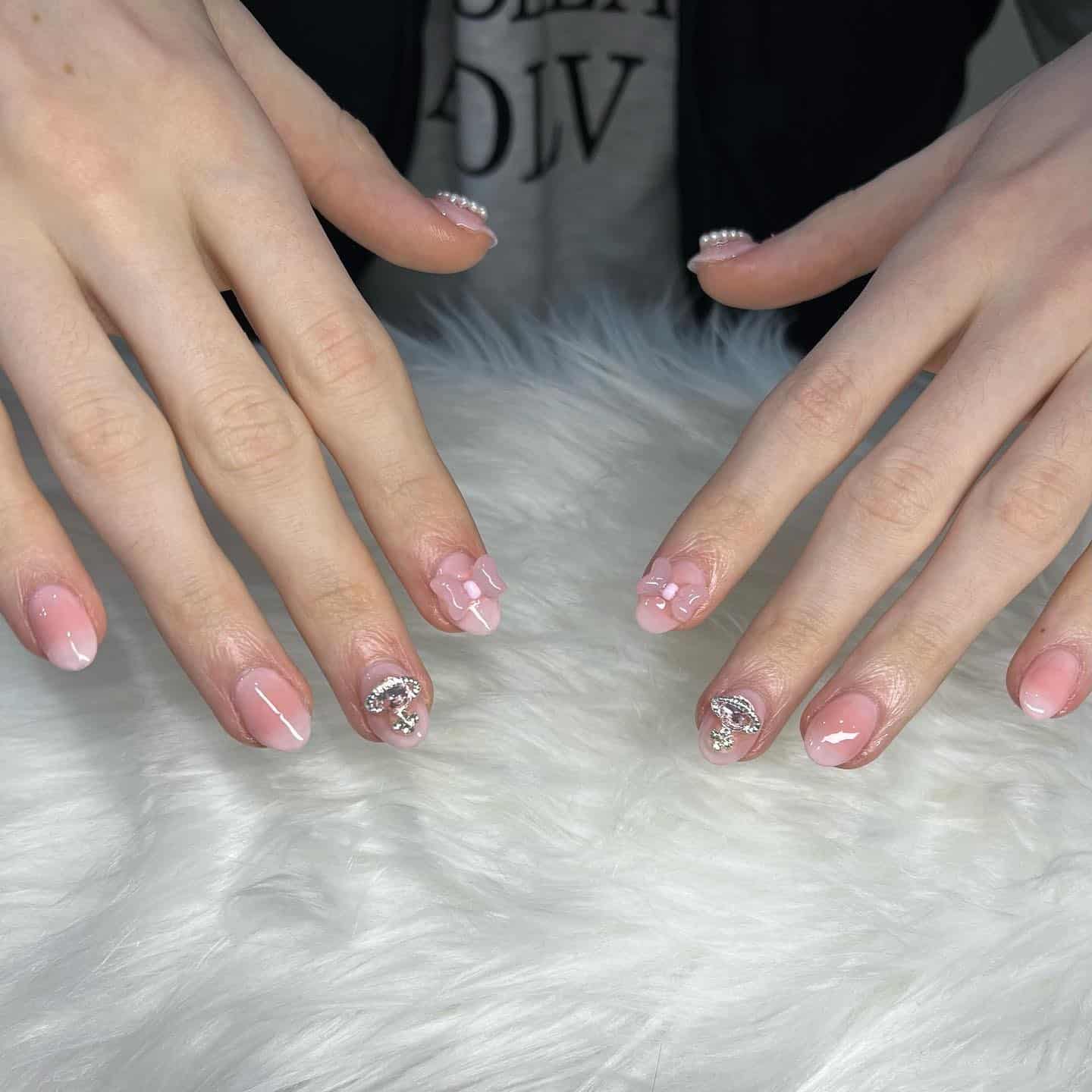 10. Baby Pink Blush Short Nails with 3D Flowers and Chrome Accents - blush nail ideas